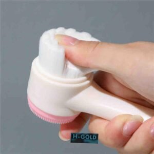 Double sided face brush